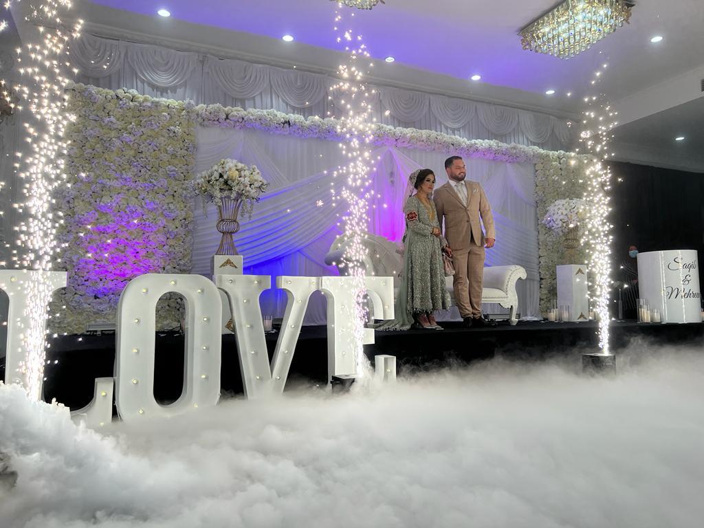 Wedding stage with cold sparks and dry ice effects